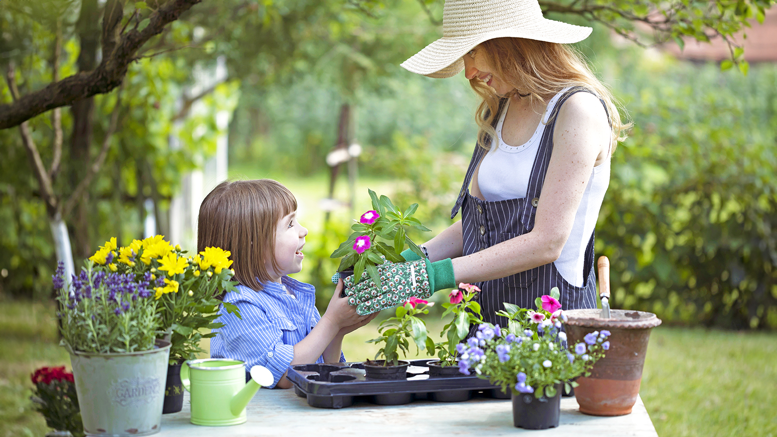 Mother and daughter gardening together
